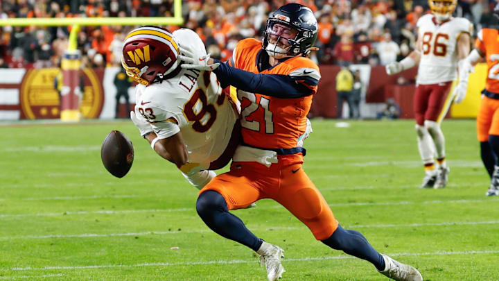 Nov 30, 2025; Landover, Maryland, USA; Washington Commanders wide receiver Jaylin Lane (83) is unable to make a reception defended by Denver Broncos cornerback Riley Moss (21) in the first quarter of the game at Northwest Stadium. Nov 30, 2025; Landover, Maryland, USA; Washington Commanders wide receiver Jaylin Lane (83) is unable to make a reception defended by Denver Broncos cornerback Riley Moss (21) in the first quarter of the game at Northwest Stadium.