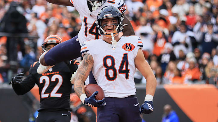 Nov 2, 2025; Cincinnati, Ohio, USA; Chicago Bears tight end Colston Loveland (84) celebrates with wide receiver Olamide Zaccheaus (14) after catching a 5-yard touchdown pass thrown by quarterback Caleb Williams (not pictured) against Cincinnati Bengals safety Geno Stone (22) during the third quarter at Paycor Stadium. Mandatory Credit: Katie Stratman-Imagn Images