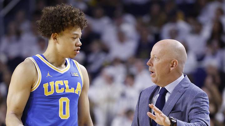 Feb 14, 2026; Ann Arbor, Michigan, USA; UCLA Bruins head coach Mick Cronin talks to guard Trent Perry (0) in the first half against the Michigan Wolverines at Crisler Center. Mandatory Credit: Rick Osentoski-Imagn Images Feb 14, 2026; Ann Arbor, Michigan, USA; UCLA Bruins head coach Mick Cronin talks to guard Trent Perry (0) in the first half against the Michigan Wolverines at Crisler Center. Mandatory Credit: Rick Osentoski-Imagn Images