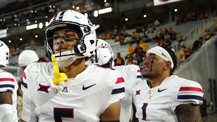 Arizona wide receiver Gio Richardson (5) and quarterback Noah Fifita (1) wait to take the field during a game at Mountain America Stadium in Tempe on Nov. 28, 2025.