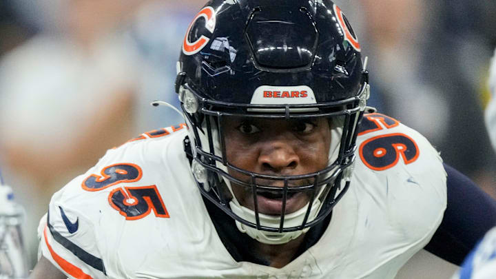 Chicago Bears defensive end DeMarcus Walker (95) moves in toward Indianapolis Colts running back Jonathan Taylor (28) on Sunday, Sept. 22, 2024, during a game against the Chicago Bears at Lucas Oil Stadium in Indianapolis.