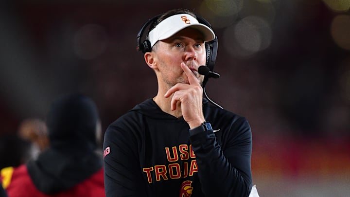Nov 7, 2025; Los Angeles, California, USA; Southern California Trojans head coach Lincoln Riley watches game action against the Northwestern Wildcats during the second half at the Los Angeles Memorial Coliseum. Mandatory Credit: Gary A. Vasquez-Imagn Images Nov 7, 2025; Los Angeles, California, USA; Southern California Trojans head coach Lincoln Riley watches game action against the Northwestern Wildcats during the second half at the Los Angeles Memorial Coliseum. Mandatory Credit: Gary A. Vasquez-Imagn Images