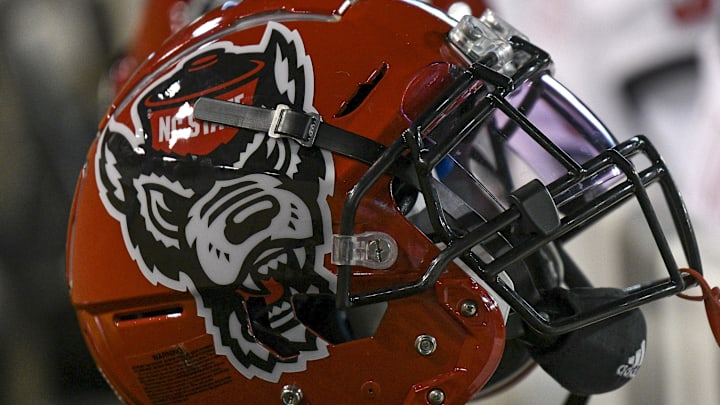 Nov 13, 2021; Winston-Salem, North Carolina, USA; A North Carolina State Wolfpack helmet seen on the sideline during the second half against the Wake Forest Demon Deacons at Truist Field. Mandatory Credit: William Howard-Imagn Images Nov 13, 2021; Winston-Salem, North Carolina, USA; A North Carolina State Wolfpack helmet seen on the sideline during the second half against the Wake Forest Demon Deacons at Truist Field. Mandatory Credit: William Howard-Imagn Images