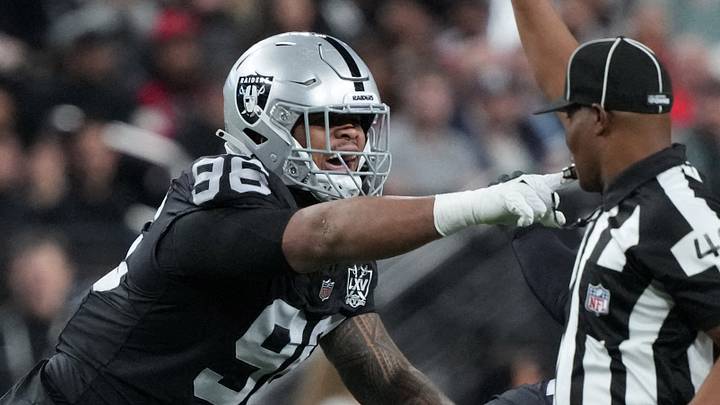 Dec 16, 2024; Paradise, Nevada, USA; Las Vegas Raiders defensive tackle Jonah Laulu (96) celebrates after sacking Atlanta Falcons quarterback Kirk Cousins (18) in the first half at Allegiant Stadium. Mandatory Credit: Kirby Lee-Imagn Images Dec 16, 2024; Paradise, Nevada, USA; Las Vegas Raiders defensive tackle Jonah Laulu (96) celebrates after sacking Atlanta Falcons quarterback Kirk Cousins (18) in the first half at Allegiant Stadium. Mandatory Credit: Kirby Lee-Imagn Images