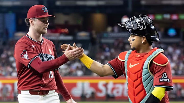 Sep 7, 2025; Phoenix, Arizona, USA; Arizona Diamondbacks pitcher Ryne Nelson (left) celebrates with catcher Gabriel Moreno following the last out of the fifth inning against the Boston Red Sox at Chase Field. Mandatory Credit: Mark J. Rebilas-Imagn Images