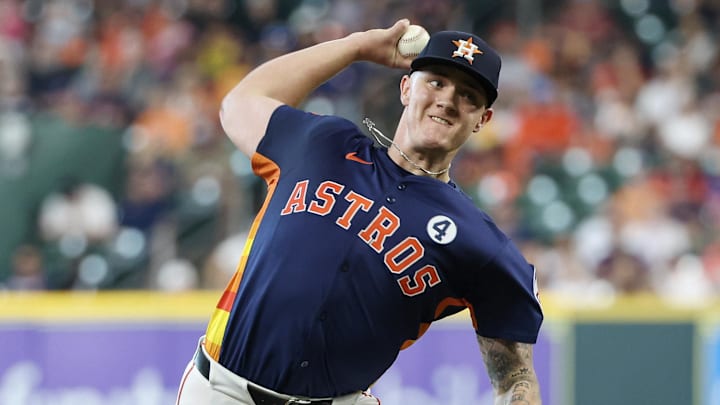 Jun 1, 2025; Houston, Texas, USA; Houston Astros starting pitcher Hunter Brown (58) pitches against the Tampa Bay Rays in the first inning at Daikin Park. 