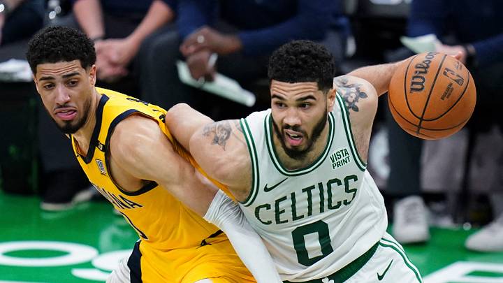 May 21, 2024; Boston, Massachusetts, USA; Boston Celtics forward Jayson Tatum (0) drives the ball against Indiana Pacers guard Tyrese Haliburton (0) in over-time during game one of the eastern conference finals for the 2024 NBA playoffs at TD Garden. Mandatory Credit: David Butler II-USA TODAY Sports May 21, 2024; Boston, Massachusetts, USA; Boston Celtics forward Jayson Tatum (0) drives the ball against Indiana Pacers guard Tyrese Haliburton (0) in over-time during game one of the eastern conference finals for the 2024 NBA playoffs at TD Garden. Mandatory Credit: David Butler II-USA TODAY Sports