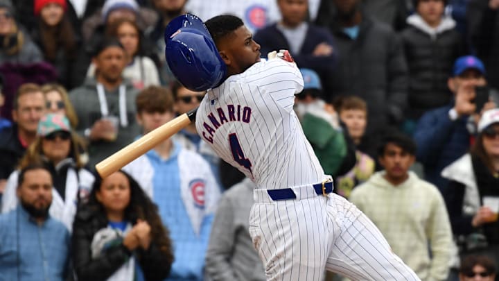 Apr 20, 2024; Chicago, Illinois, USA; Chicago Cubs left fielder Alexander Canario (4) strikes out swinging during the ninth inning against the Miami Marlins at Wrigley Field. Apr 20, 2024; Chicago, Illinois, USA; Chicago Cubs left fielder Alexander Canario (4) strikes out swinging during the ninth inning against the Miami Marlins at Wrigley Field.