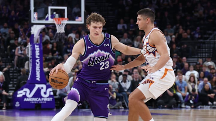 Oct 27, 2025; Salt Lake City, Utah, USA; Utah Jazz forward Lauri Markkanen (23) dribbles against Phoenix Suns guard Grayson Allen (8) during overtime at Delta Center. Mandatory Credit: Rob Gray-Imagn Images Oct 27, 2025; Salt Lake City, Utah, USA; Utah Jazz forward Lauri Markkanen (23) dribbles against Phoenix Suns guard Grayson Allen (8) during overtime at Delta Center. Mandatory Credit: Rob Gray-Imagn Images