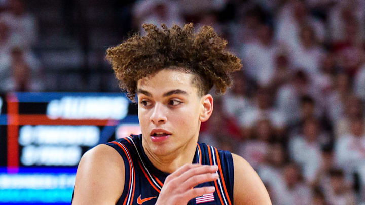 Feb 1, 2026; Lincoln, Nebraska, USA; Illinois Fighting Illini guard Keaton Wagler (23) drives against Nebraska Cornhuskers guard Sam Hoiberg (1) during the second half at Pinnacle Bank Arena. Feb 1, 2026; Lincoln, Nebraska, USA; Illinois Fighting Illini guard Keaton Wagler (23) drives against Nebraska Cornhuskers guard Sam Hoiberg (1) during the second half at Pinnacle Bank Arena.