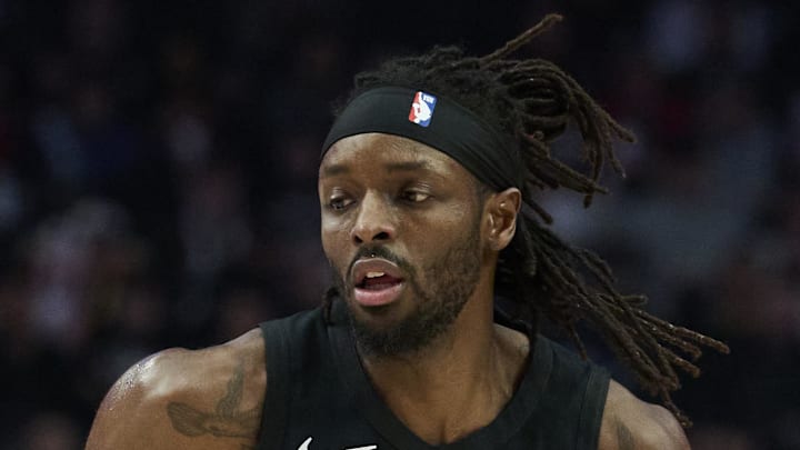 Portland Trail Blazers forward Jerami Grant dribbles the ball against Dallas Mavericks forward P.J. Washington