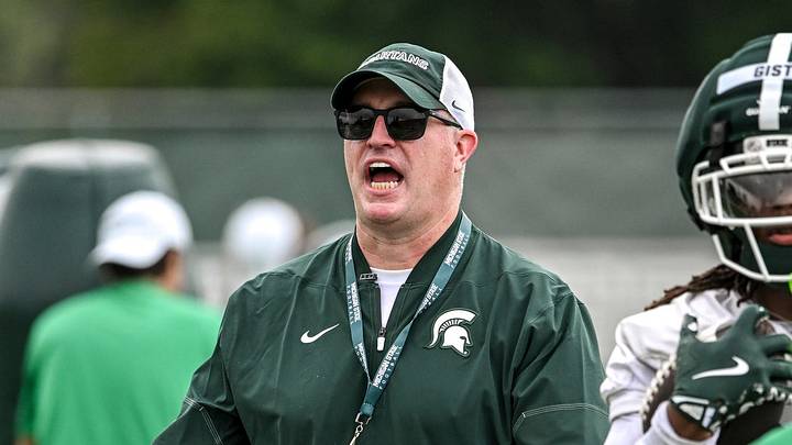 Michigan State’s head coach Pat Fitzgerald calls out to players during football practice on Thursday, Aug. 6, 2026, in East Lansing. Michigan State’s head coach Pat Fitzgerald calls out to players during football practice on Thursday, Aug. 6, 2026, in East Lansing.