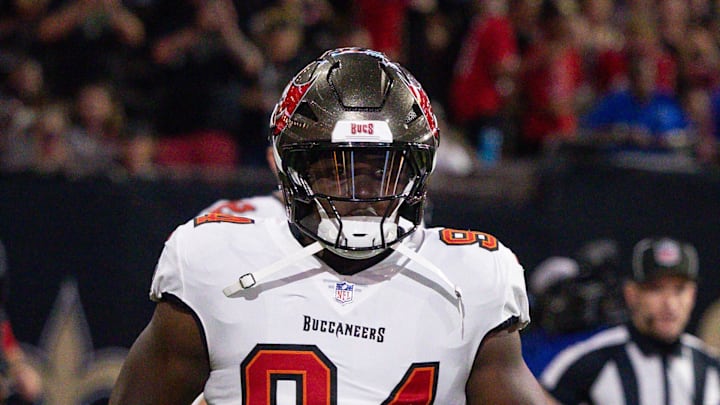 Tampa Bay Buccaneers defensive tackle Calijah Kancey (94) run on the field against the New Orleans Saints.