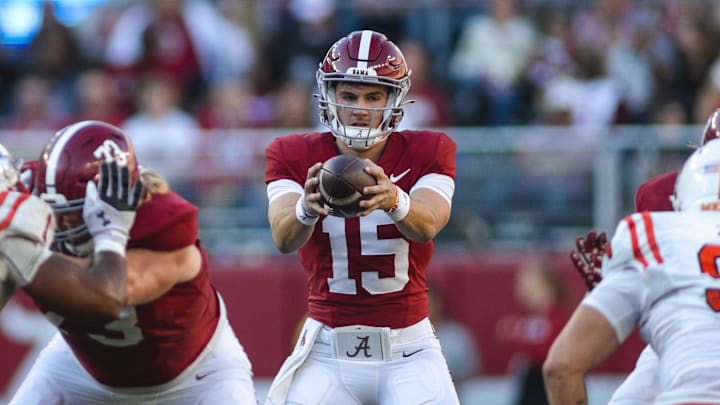 Nov 16, 2024; Tuscaloosa, Alabama, USA; Alabama Crimson Tide quarterback Ty Simpson (15) receives a snapped ball against the Mercer Bears during the third quarter at Bryant-Denny Stadium. Mandatory Credit: Will McLelland-Imagn Images