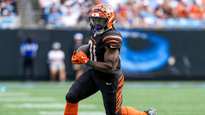 Sep 29, 2024; Charlotte, North Carolina, USA; Cincinnati Bengals running back Zack Moss (31) runs the ball against the Carolina Panthers during the fourth quarter at Bank of America Stadium. Mandatory Credit: Jim Dedmon-Imagn Images