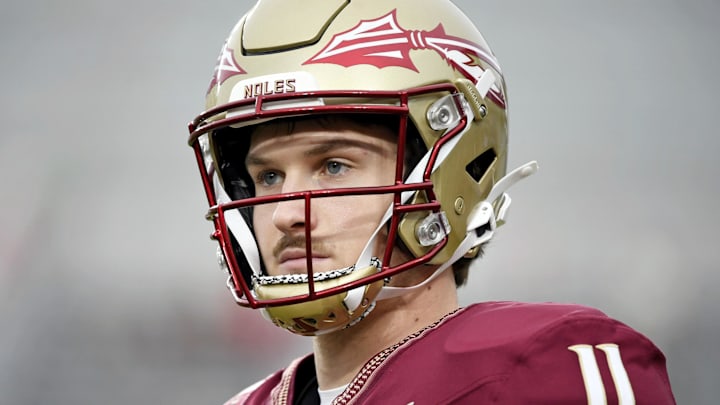 Oct 5, 2024; Tallahassee, Florida, USA; Florida State Seminoles quarterback Brock Glenn (11) looks on before the game against the Clemson Tigers at Doak S. Campbell Stadium. Mandatory Credit: Melina Myers-Imagn Images