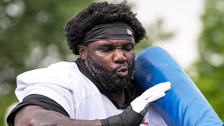 Defensive tackle D.J. Reader goes through drills at Detroit Lions training camp last year.