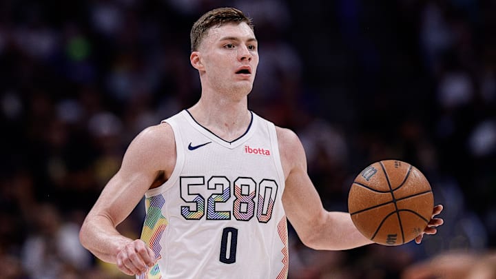 May 15, 2025; Denver, Colorado, USA; Denver Nuggets guard Christian Braun (0) dribbles the ball up court in the third quarter against the Oklahoma City Thunder during game six of the second round for the 2025 NBA Playoffs at Ball Arena. Mandatory Credit: Isaiah J. Downing-Imagn Images May 15, 2025; Denver, Colorado, USA; Denver Nuggets guard Christian Braun (0) dribbles the ball up court in the third quarter against the Oklahoma City Thunder during game six of the second round for the 2025 NBA Playoffs at Ball Arena. Mandatory Credit: Isaiah J. Downing-Imagn Images
