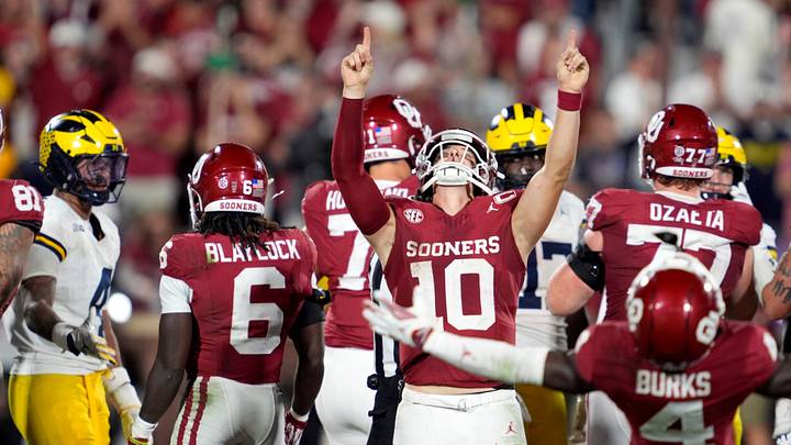 Oklahoma quarterback John Mateer (10) and the Sooners celebrate last year's 24-13 victory over the Michigan Wolverines. Oklahoma quarterback John Mateer (10) and the Sooners celebrate last year's 24-13 victory over the Michigan Wolverines.