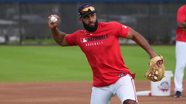 Feb 18, 2025; West Palm Beach, FL, USA;  Washington Nationals outfielder Amed Rosario (13) takes infield practice during spring training.