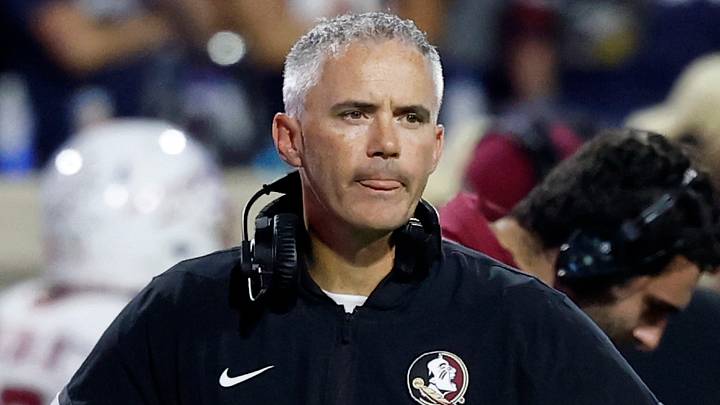 Sep 26, 2025; Charlottesville, Virginia, USA; Florida State Seminoles head coach Mike Norvell looks on during a stoppage in play against the Virginia Cavaliers at Scott Stadium. Mandatory Credit: Geoff Burke-Imagn Images Sep 26, 2025; Charlottesville, Virginia, USA; Florida State Seminoles head coach Mike Norvell looks on during a stoppage in play against the Virginia Cavaliers at Scott Stadium. Mandatory Credit: Geoff Burke-Imagn Images