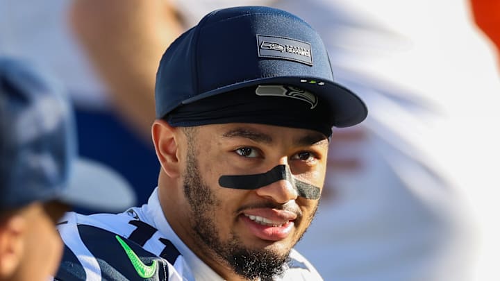 Jaxon Smith-Njigba of the Seattle Seahawks smiles Jaxon Smith-Njigba of the Seattle Seahawks smiles