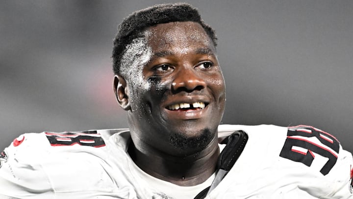 Oct 13, 2024; Charlotte, North Carolina, USA; Atlanta Falcons defensive tackle Ruke Orhorhoro (98) walks off the field after the game at Bank of America Stadium. Mandatory Credit: Bob Donnan-Imagn Images