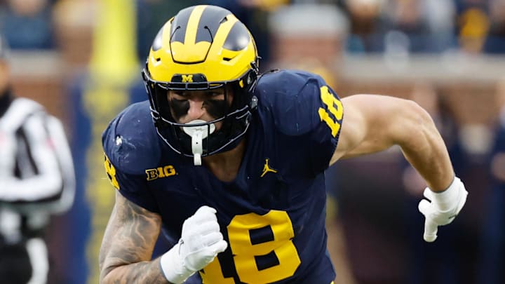 Nov 23, 2024; Ann Arbor, Michigan, USA;  Michigan Wolverines tight end Colston Loveland (18) runs a route against the Northwestern Wildcats at Michigan Stadium. Mandatory Credit: Rick Osentoski-Imagn Images