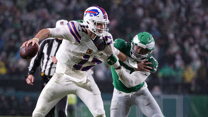 Nov 26, 2023; Philadelphia, Pennsylvania, USA; Philadelphia Eagles linebacker Haason Reddick (7) sacks Buffalo Bills quarterback Josh Allen (17) during the second quarter at Lincoln Financial Field. Mandatory Credit: Bill Streicher-Imagn Images