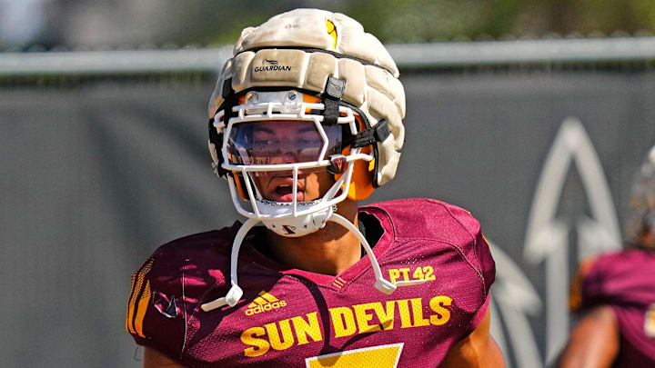 Arizona State wide receiver Reed Harris (3) high fives kids that came to see the team practice during a spring practice at Kajikawa practice fields in Tempe, Ariz. on April 14, 2026.