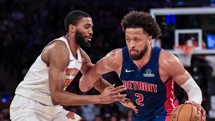Feb 19, 2026; New York, New York, USA; Detroit Pistons guard Cade Cunningham (2) is guarded by New York Knicks guard Mikal Bridges (25) during the second half at Madison Square Garden. Mandatory Credit: Vincent Carchietta-Imagn Images