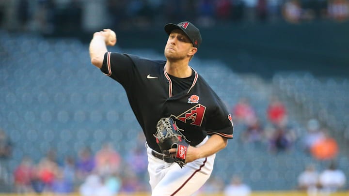 Arizona Diamondbacks starting pitcher Merrill Kelly (29) throws against the New York Mets during the first inning at Chase Field on May 31, 2021. Arizona Diamondbacks starting pitcher Merrill Kelly (29) throws against the New York Mets during the first inning at Chase Field on May 31, 2021.