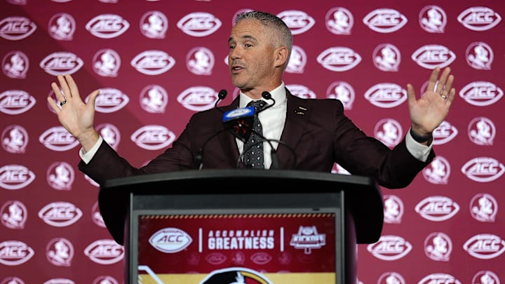 Jul 23, 2025; Charlotte, NC, USA; aFlorida State head coach Mike Norvell answers questions from the media during ACC Media days at Hilton Charlotte Uptown. Mandatory Credit: Jim Dedmon-Imagn Images