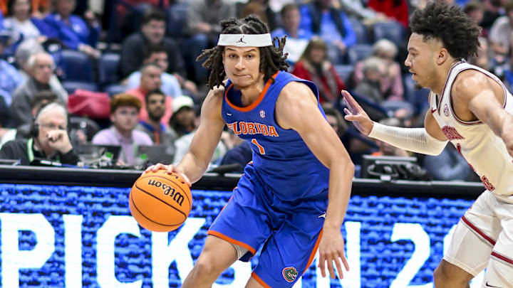 Mar 15, 2024; Nashville, TN, USA; Florida Gators guard Walter Clayton Jr. (1) drives baseline against the Alabama Crimson Tide during the first half at Bridgestone Arena. Mandatory Credit: Steve Roberts-Imagn Images Mar 15, 2024; Nashville, TN, USA; Florida Gators guard Walter Clayton Jr. (1) drives baseline against the Alabama Crimson Tide during the first half at Bridgestone Arena. Mandatory Credit: Steve Roberts-Imagn Images