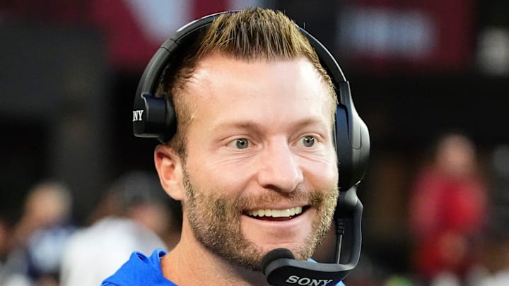 Los Angeles Rams head coach Sean McVay smiles after a touchdown by wide receiver Puka Nacua (12) against the Arizona Cardinals in the second half at State Farm Stadium on Dec 7, 2025, in Glendale, Ariz.