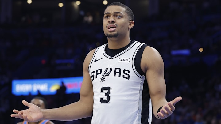 Jan 13, 2026; Oklahoma City, Oklahoma, USA; San Antonio Spurs forward/guard Keldon Johnson (3) reacts after a play against the Oklahoma City Thunder during the second half at Paycom Center. Mandatory Credit: Alonzo Adams-Imagn Images