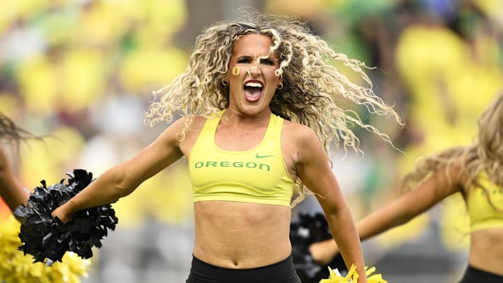 Oct 26, 2024; Eugene, Oregon, USA; Oregon Ducks cheerleaders perform during a time out in the second half in a game against the Illinois Fighting Illini at Autzen Stadium. Mandatory Credit: Troy Wayrynen-Imagn Images