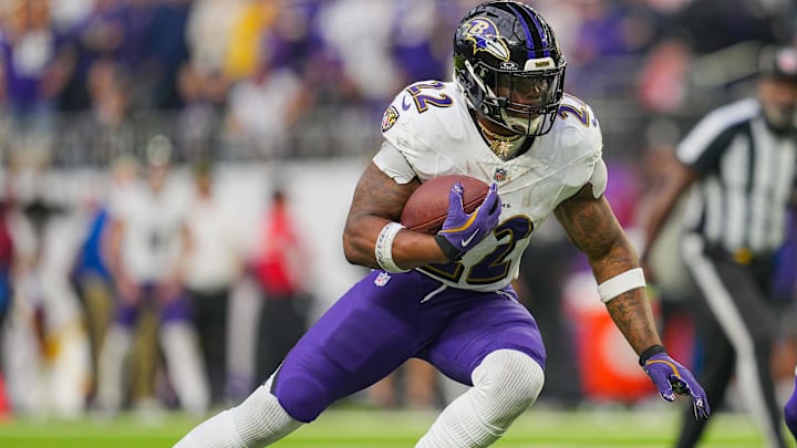 Nov 9, 2025; Minneapolis, Minnesota, USA; Baltimore Ravens running back Derrick Henry (22) runs with the ball against the Minnesota Vikings in the fourth quarter at U.S. Bank Stadium. Mandatory Credit: Brad Rempel-Imagn Images
