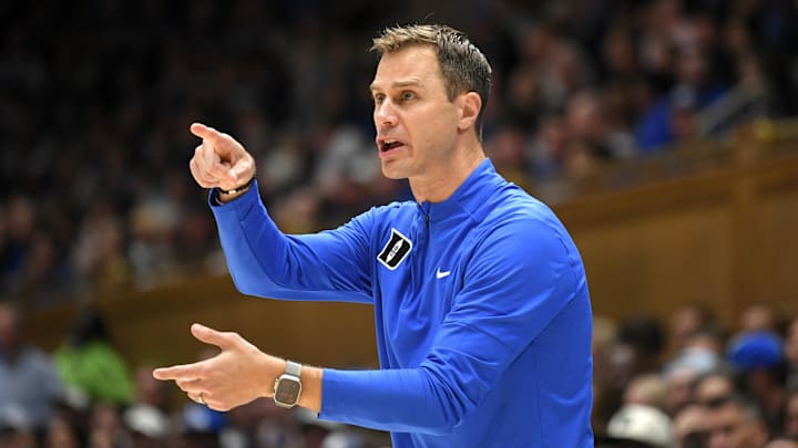 Nov 4, 2024; Durham, North Carolina, USA; Duke Blue Devils head coach Jon Scheyer reacts at Cameron Indoor Stadium during the second half against the Maine Black Bears. Mandatory Credit: Zachary Taft-Imagn Images