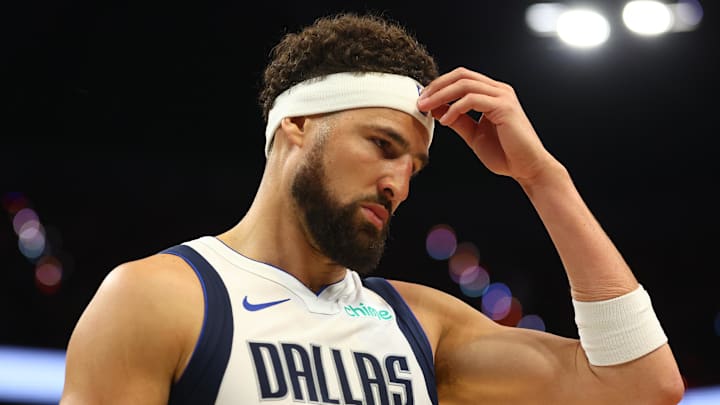Oct 26, 2024; Phoenix, Arizona, USA; Dallas Mavericks guard Klay Thompson (31) reacts against the Phoenix Suns at Footprint Center. Mandatory Credit: Mark J. Rebilas-Imagn Images