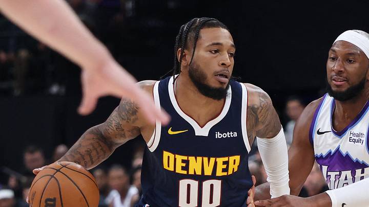 Oct 6, 2026; Salt Lake City, Utah, USA; Denver Nuggets forward Cam Whitmore (00) drives against Utah Jazz guard Josh Okogie (21) during the second half at Delta Center. Mandatory Credit: Rob Gray-Imagn Images Oct 6, 2026; Salt Lake City, Utah, USA; Denver Nuggets forward Cam Whitmore (00) drives against Utah Jazz guard Josh Okogie (21) during the second half at Delta Center. Mandatory Credit: Rob Gray-Imagn Images