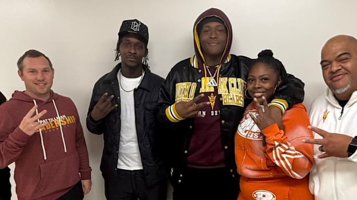 2026 offensive tackle commit Cortavious Tisaby dressed out in Sun Devils team gear