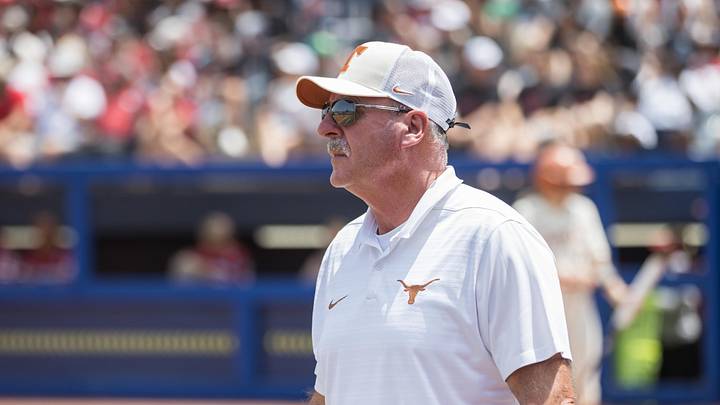 Texas Longhorns head coach Mike White looks across the field in the first inning against the Oklahoma Sooners.
