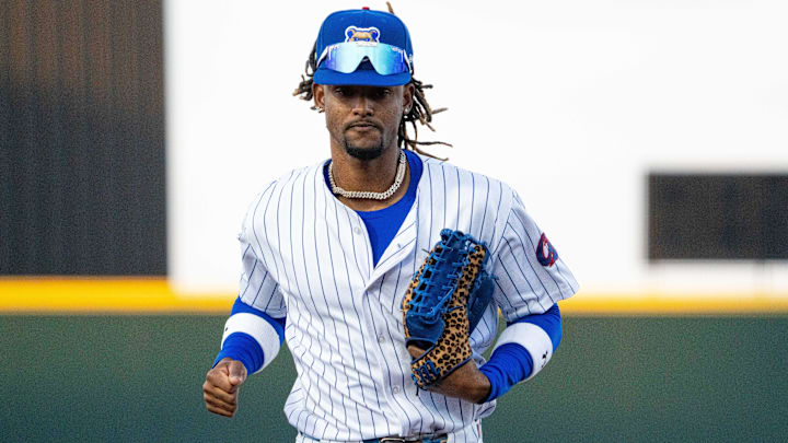 Iowa Cubs' Kevin Alcantara (9) runs to the dugout during opening day against the Omaha Storm Chasers on Friday, March 28, 2025, at Principal Park in Des Moines. Iowa Cubs' Kevin Alcantara (9) runs to the dugout during opening day against the Omaha Storm Chasers on Friday, March 28, 2025, at Principal Park in Des Moines.
