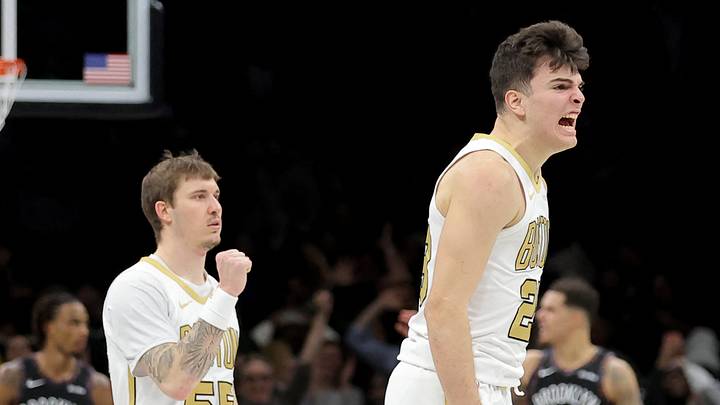 Jan 23, 2026; Brooklyn, New York, USA; Boston Celtics guard Hugo Gonzalez (28) celebrates his three point shot against the Brooklyn Nets with guards Baylor Scheierman (55) and Payton Pritchard (11) during the first overtime at Barclays Center. Mandatory Credit: Brad Penner-Imagn Images Jan 23, 2026; Brooklyn, New York, USA; Boston Celtics guard Hugo Gonzalez (28) celebrates his three point shot against the Brooklyn Nets with guards Baylor Scheierman (55) and Payton Pritchard (11) during the first overtime at Barclays Center. Mandatory Credit: Brad Penner-Imagn Images