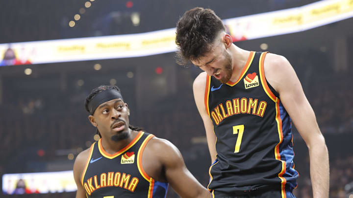May 5, 2025; Oklahoma City, Oklahoma, USA; Oklahoma City Thunder guard Luguentz Dort (5) checks on forward Chet Holmgren (7) after he was hit during a play against the Denver Nuggets during the first quarter during game one of the second round for the 2025 NBA Playoffs at Paycom Center. Mandatory Credit: Alonzo Adams-Imagn Images May 5, 2025; Oklahoma City, Oklahoma, USA; Oklahoma City Thunder guard Luguentz Dort (5) checks on forward Chet Holmgren (7) after he was hit during a play against the Denver Nuggets during the first quarter during game one of the second round for the 2025 NBA Playoffs at Paycom Center. Mandatory Credit: Alonzo Adams-Imagn Images