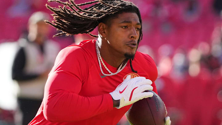 Oct 19, 2025; Kansas City, Missouri, USA; Kansas City Chiefs running back Isiah Pacheco (10) warms up prior to the game against the Las Vegas Raiders at GEHA Field at Arrowhead Stadium. Mandatory Credit: Denny Medley-Imagn Images