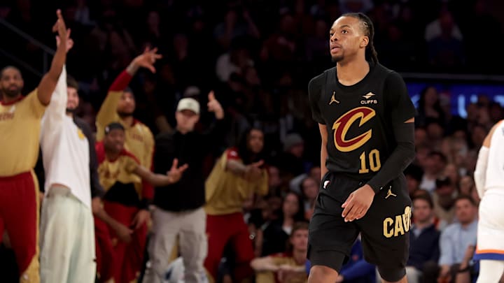 Apr 11, 2025; New York, New York, USA; Cleveland Cavaliers guard Darius Garland (10) and the Cavalier bench react after his three point shot against the New York Knicks during the fourth quarter at Madison Square Garden. Mandatory Credit: Brad Penner-Imagn Images