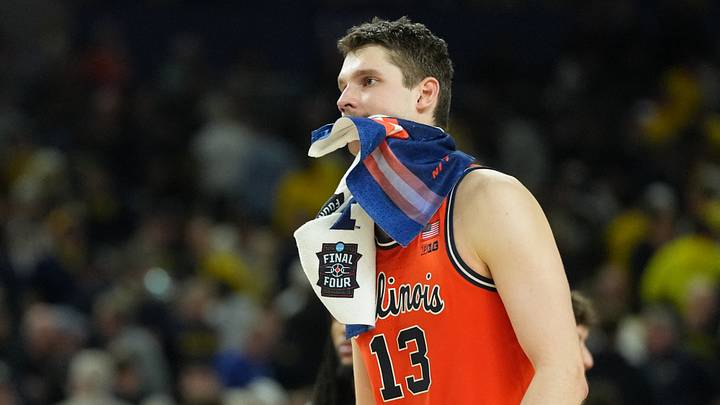 Apr 4, 2026; Indianapolis, IN, USA; Illinois Fighting Illini center Tomislav Ivisic (13) reacts after losing to the Connecticut Huskies during a semifinal of the Final Four of the men's 2026 NCAA Tournament at Lucas Oil Stadium. Mandatory Credit: Robert Deutsch-Imagn Images Apr 4, 2026; Indianapolis, IN, USA; Illinois Fighting Illini center Tomislav Ivisic (13) reacts after losing to the Connecticut Huskies during a semifinal of the Final Four of the men's 2026 NCAA Tournament at Lucas Oil Stadium. Mandatory Credit: Robert Deutsch-Imagn Images