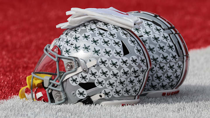 Nov 4, 2023; Piscataway, New Jersey, USA; Ohio State Buckeyes helmets rest on the field before the game against the Rutgers Scarlet Knights at SHI Stadium. Mandatory Credit: Vincent Carchietta-Imagn Images
